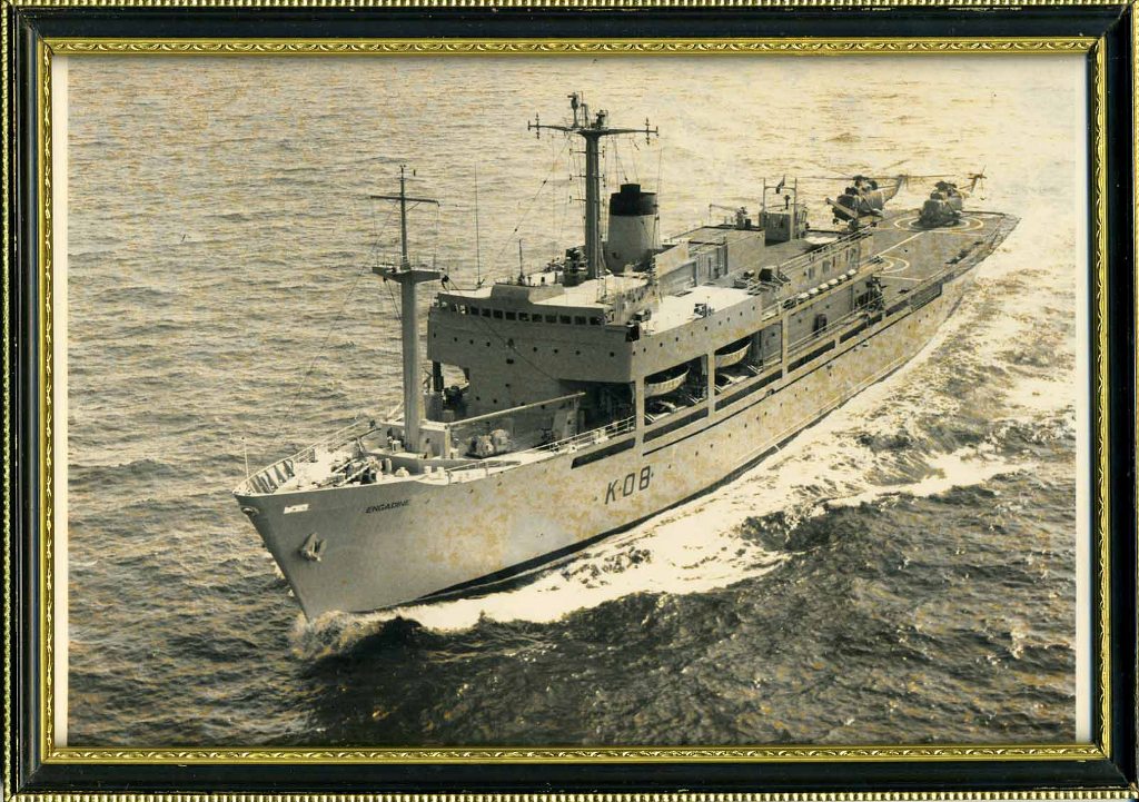 RFA ENGADINE  1967 - 1989
Framed photo.
Helicopter Support and Training Ship
Tonnages: 6384 gross, 2848 net, 4520 deadweight, 8950 full load displacement. Length overall: 424ft lin. Beam: 58ft Sin
Draught: 22ft lin Depth: 35ft 4in. Machinery: 5-cylinder Wallsend/Sulzer RD68 diesel engine, 5500bhp, single shaft
Speed: 16 knots. Aircraft: Support capability for 4 x Westland Wessex, or 2 x Westland Sea King, or 2 x Westland Wasp. Complement: 63 RFA, 32 RN + 131 training.
Builder Henry Robb.
She replaced HMS Lofoten.
Home port for Engadine was Portland for the whole of its career. During the Lebanon crisis of 1976, she was deployed as part of contingency plans to evacuate British citizens. She attended the Silver Jubilee fleet review on 28 June 1977, and took part in the Falklands campaign, during which she operated as a helicopter support and refuelling base in San Carlos Water. Engadine was taken out of service in March 1989 and laid up at Devonport. Sold to Greece 1990. Scrapped Alang 1997. 

