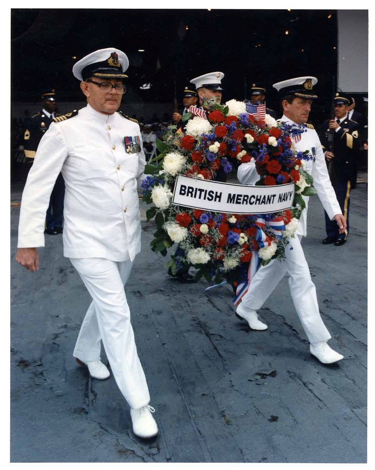 MEMORIAL DAY U.S.
27 May 1996. Capt PJG Roberts & Capt DM Pitt lay a wreath to the British Merchant Navy on board USS Intrepid, Pier 86 New York.
