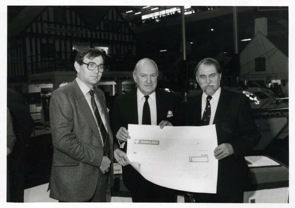 BOAT SHOW 1986
Presentation of cheque to RNLI.
Capt Phillip Roberts, RADM Sir Peter Campstan, Capt Gordon Butterworth.
