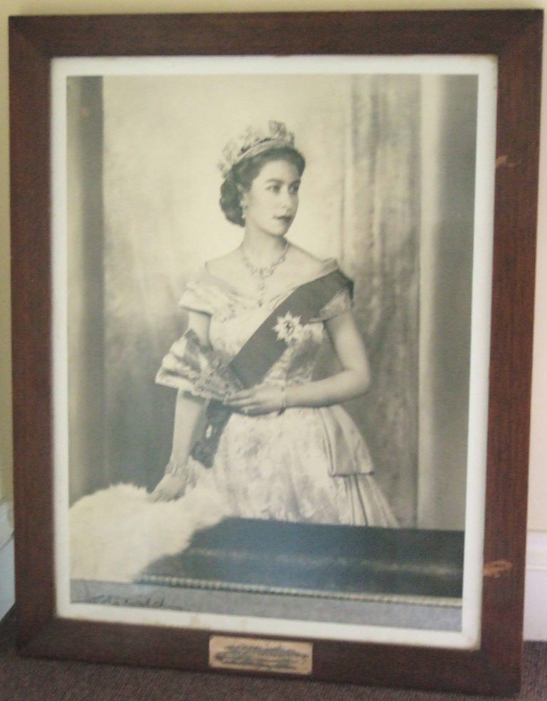 HM Queen Elizabeth II
Framed portait photiograph with silver plaque. Presented by Lady Raw  at the launch of RFA TIDEREACH, 2 June 1954.
