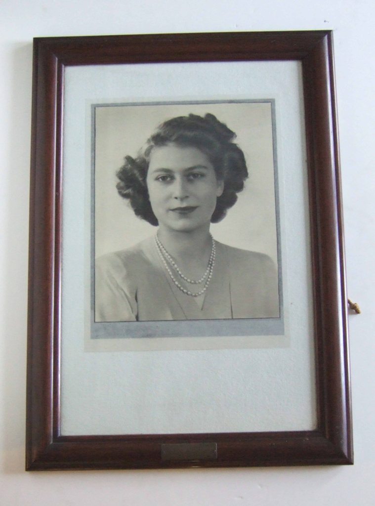 HM Queen Elizabeth II
As Princess Elizabeth. Framed portrait with silver plaque. Presented by Mrs WF Mitchell to RFA EDDYBAY, 29 November 1951.
