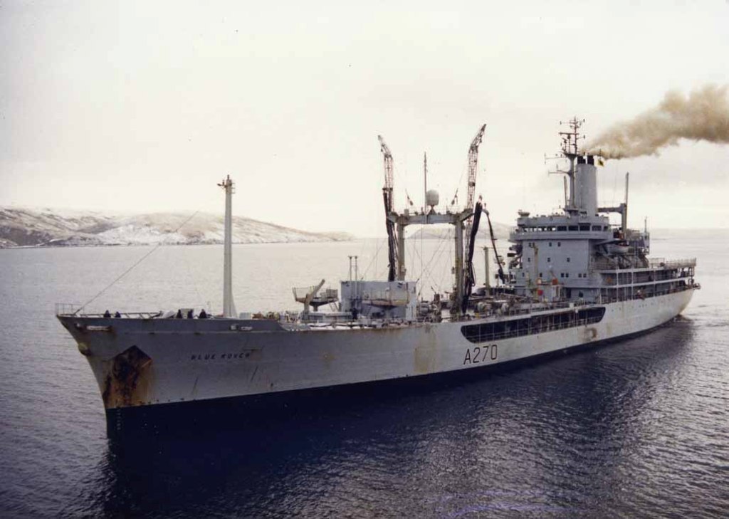 RFA BLUE ROVER
Blue Rover was the support tanker for the Royal Yacht's tour of the Pacific during 1971-2, and had to be towed to Singapore by Britannia, after losing her rudder.
1973 Clyde tanker and first WIGS deployment. Falklands campaign in 1982, being based at South Georgia as station oiler for a time. She was taken out of service in February 1993. Blue Rover was sold to the Portuguese Navy in March 1993 and renamed Berrio. 
Photo San Carlos Water 1986.
Rover Class Small Fleet Replenishment Tankers. Built 1969 - 1974. 6931 dwt. Gold and Black still in service.

RFA Green Rover A268 (sold Indonesia). RFA Grey Rover A269. RFA Blue Rover A270 (sold Portugal). RFA Gold Rover A 271. RFA Black Rover A273.
Length overall: 461ft. Beam: 63ft. Draught: 24ft. Depth: 33ft 6in
Machinery: 2 x 16-cylinder Ruston & Hornsby diesels, 16,000bhp, on first three vessels, later replaced by 2 x 16-cylinder Crossley-Pielstick PA4 diesels, 15,382bhp; Gold Rover, Black Rover were fitted with 2 x 16-cylinder Crossley-Pielstick PA4 diesels, 15,360bhp; single shaft, bow thruster Speed: 18 knots Range: 15,000 miles / 15 knots Armament: 2 x 20mm Oerlikon, 2 x 7.62mm MG Aircraft: Helicopter deck, no hangar Complement: 54 
