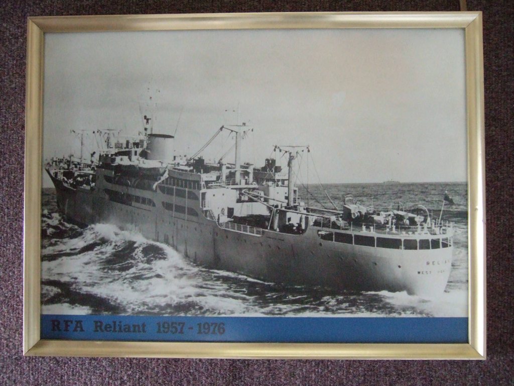 RFA RELIANT (2)  1957 - 1976
Framed photo.
Air Stores Issuing Ship. RFA Reliant (2). A 84. (Ex Somersby). GRT 8460. Built 1954. RFA service 1957 - 1976.
length overall: 469ft. Beam: 61ft 6in. Draught: 26ft. Depth: 39ft 9in.
Machinery: 6-cylinder Hawthorn Leslie/Doxford diesel engine, 7500bhp, single shaft. Speed: 16 knots
Complement: 102-110 RFA and stores personnel
