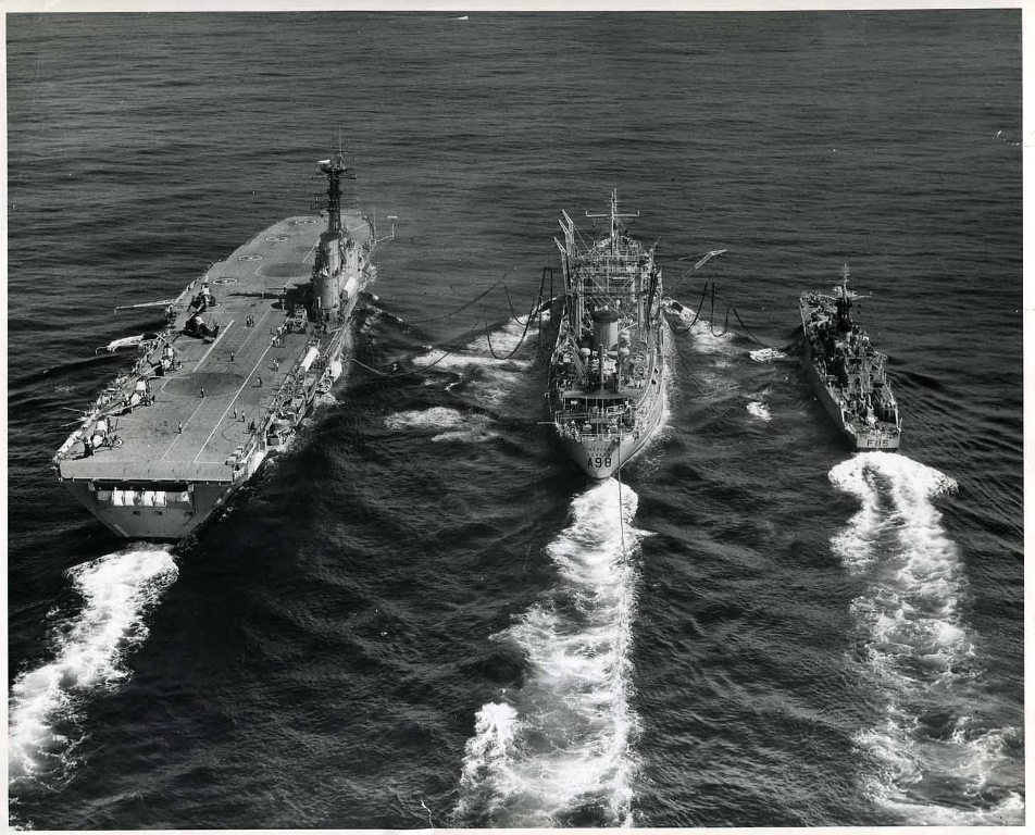 RFA TIDESURGE  1958-1976
Tiderange was renamed Tidesurge on 28 June 1958. Major refit at Swan Hunter 1963. Decommissioned in May 1976 at Portsmouth. Scrapped Valencia 1977. 
RAS with HMS Bulwark & HMS Berwick, South China Sea, January 1965.
