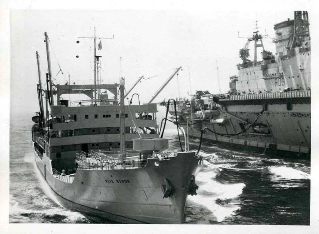 RFA WAVE BARON  1948-1972
Launched as Empire Flodden. Modernised during 1961-2, and had a further refit, at Swansea, in 1966. Laid up at Devonport in December 1969 and sold for breaking in 1972. 
Fuelling HMS Ark Royal.

Wave Class tankers. Built 1943-1946. 12000dwt. Wave Ruler in service until 1976. * Indicates modification to Fast Fleet Replenishment Ships.

RFA Wave Sovereign* A211, RFA Wave Ruler* A212, RFA Wave Knight* A249, RFA Wave Chief* A265, RFA Wave Prince* A207, RFA Wave Master* A193, RFA Wave Victor* A220, RFA Wave Baron* A242, RFA Wave Duke A246, RFA Wave King A182, RFA Wave Laird A119, RFA Wave Regent A210, RFA Wave Premier A129, RFA Wave Monarch A108, RFA Wave Chiropodist A999, (just testing!) RFA Wave Liberator A248, RFA Wave Commander A244, RFA Wave Conqueror A245, RFA Wave Emperor A100, RFA Wave Protector A215, RFA Wave Governor A247.
Tonnage: 8141-8199 gross, 4545-4664 net, 11,600-11,955 deadweight, 16,650 load displacement.
Length: 492ft 8in. Beam: 64ft 4in Draught: 28ft 6in. Depth: 35ft 6in. Machinery: 2 X geared steam turbines, 6800shp, water tube boilers, single shaft. Speed: 14.5-15 knots
Complement: 60 RFA 
